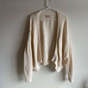 Cream colored cardigan sweater from urban outfitters. Size xs. Oversized